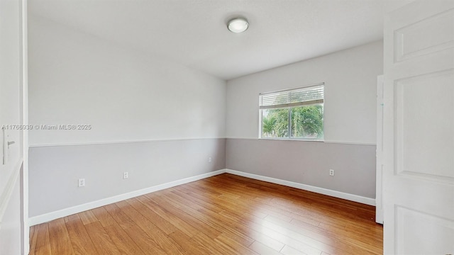 14214 SW 129th Path, Miami, FL 33186 - spare room featuring light wood-style floors and baseboards