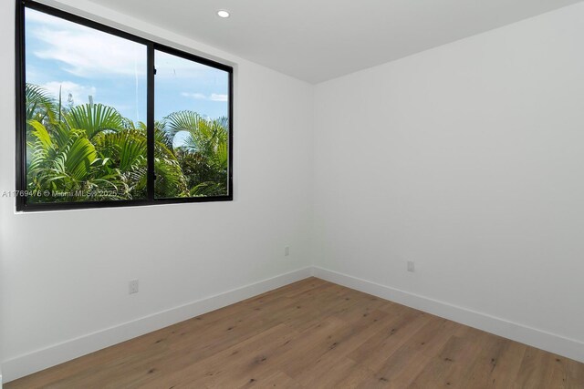 1635 E Broward Blvd, Fort Lauderdale, FL 33301 - unfurnished room featuring baseboards, light wood finished floors, and recessed lighting