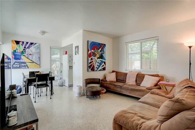 living room with speckled floor
