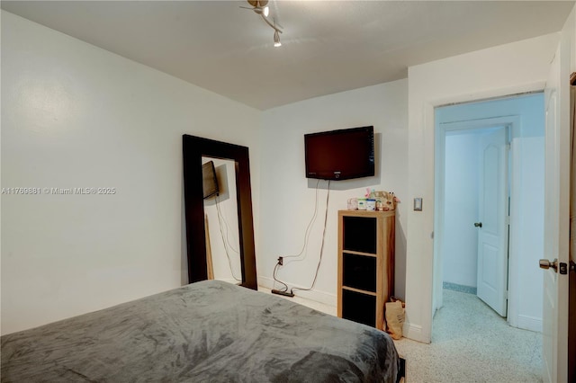 bedroom with baseboards