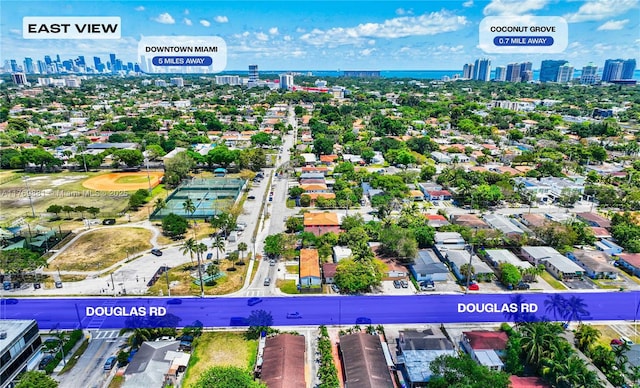 birds eye view of property with a city view