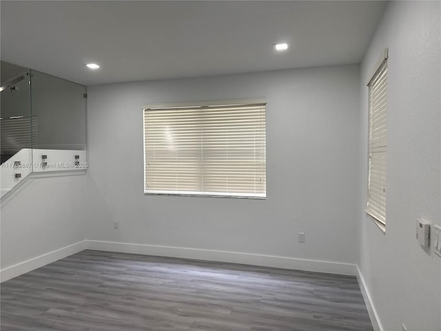 9840 NW 86th Ter, Doral, FL 33178 - empty room featuring baseboards, wood finished floors, and recessed lighting
