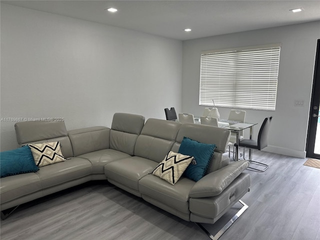 9840 NW 86th Ter, Doral, FL 33178 - living room featuring baseboards, light wood-style floors, and recessed lighting