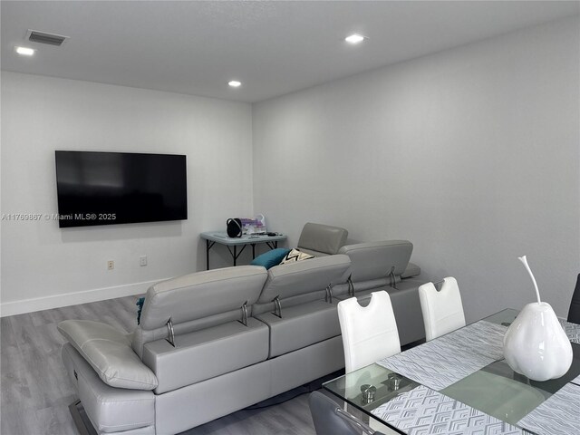 9840 NW 86th Ter, Doral, FL 33178 - living room with baseboards, visible vents, wood finished floors, and recessed lighting