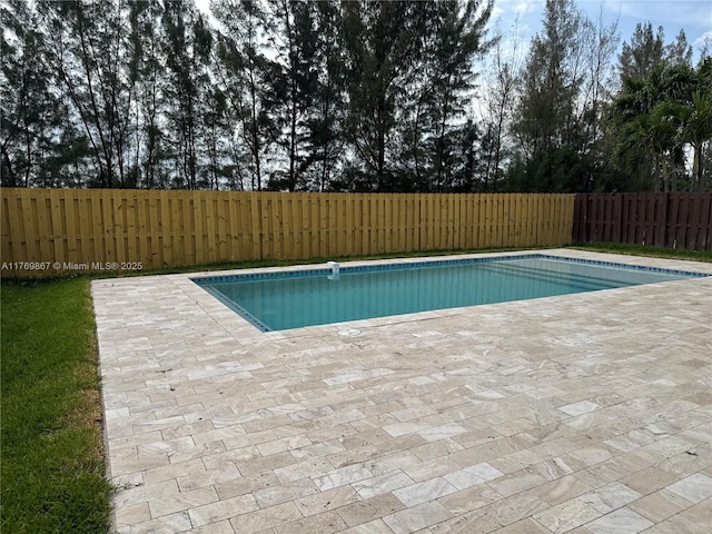 9840 NW 86th Ter, Doral, FL 33178 - view of pool with a fenced backyard, a patio area, and a fenced in pool