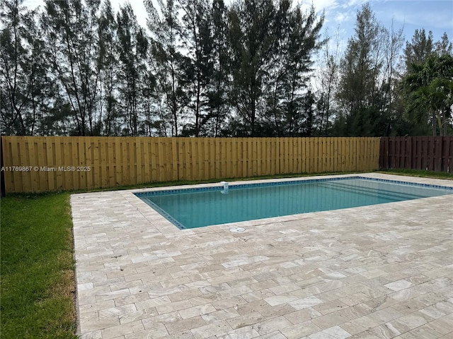 9840 NW 86th Ter, Doral, FL 33178 - view of swimming pool with a fenced backyard, a patio, and a fenced in pool