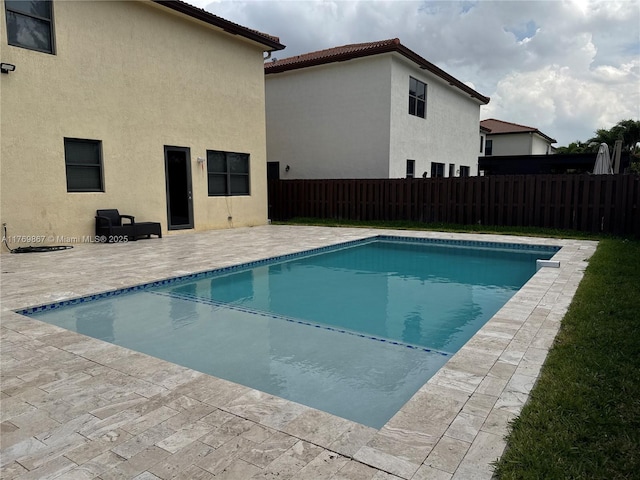 9840 NW 86th Ter, Doral, FL 33178 - view of pool with a patio, a fenced in pool, and a fenced backyard