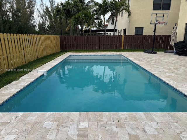 9840 NW 86th Ter, Doral, FL 33178 - view of pool with a fenced backyard, a patio area, and a fenced in pool