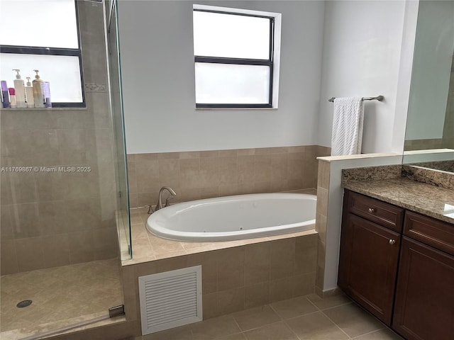 9840 NW 86th Ter, Doral, FL 33178 - bathroom with tiled shower, vanity, a tub with jets, tile patterned flooring, and visible vents