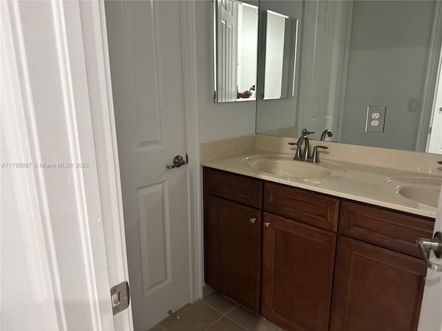 9840 NW 86th Ter, Doral, FL 33178 - bathroom with tile patterned floors, double vanity, and a sink
