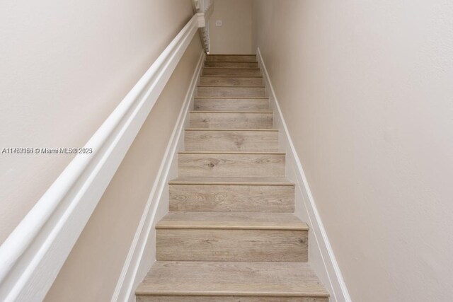 4834 NW 58th Mnr, Coconut Creek, FL 33073 - stairs with wood finished floors
