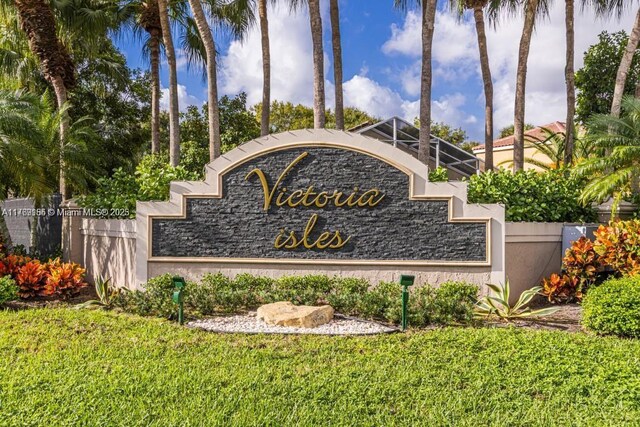 4834 NW 58th Mnr, Coconut Creek, FL 33073 - community sign with a lawn