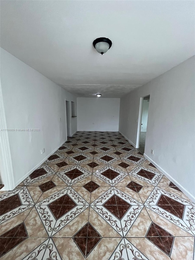 1167 NE 111th St, Miami, FL 33161 - tiled spare room with baseboards