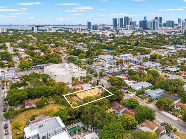 birds eye view of property with a city view