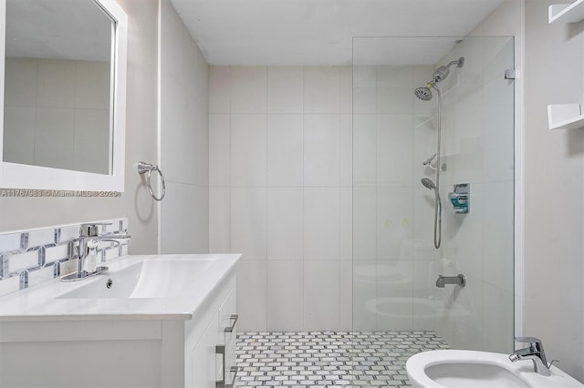 881 Hialeah Dr, Hialeah, FL 33010 - full bathroom featuring a stall shower, vanity, tile walls, a bidet, and backsplash