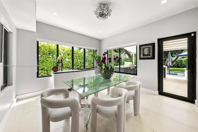 kitchen with modern cabinets, visible vents, white cabinets, decorative backsplash, and range with two ovens