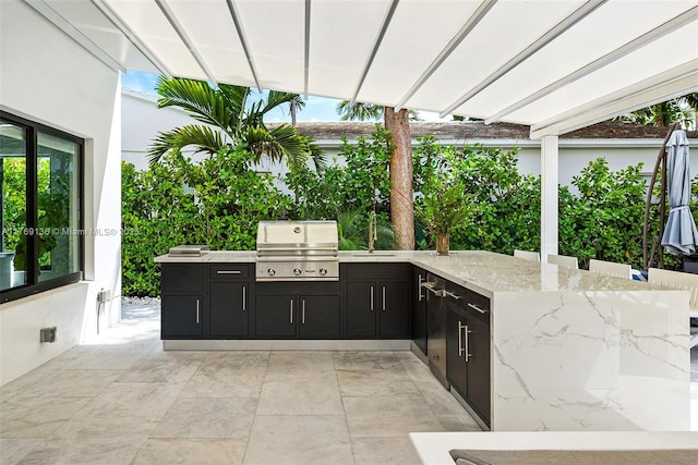 dining room featuring light tile patterned floors and baseboards
