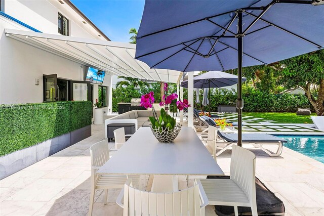 6166 Pine Tree Dr, Miami Beach, FL 33140 - view of patio / terrace featuring outdoor dining space