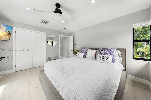 office area featuring ceiling fan and light wood-style floors