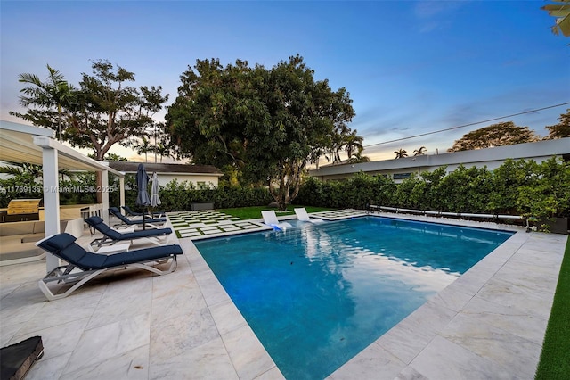 outdoor pool with a patio