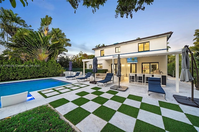 pool featuring a patio
