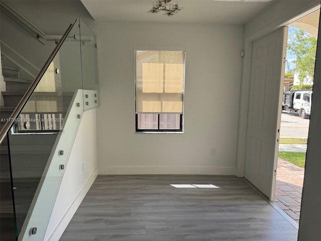 10086 NW 89th Ter, Doral, FL 33178 - interior space featuring baseboards, stairs, and wood finished floors