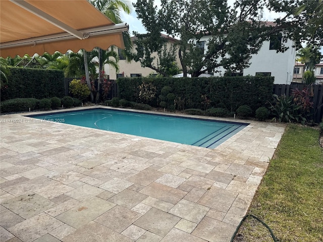 10086 NW 89th Ter, Doral, FL 33178 - view of pool featuring a patio, a fenced in pool, and a fenced backyard
