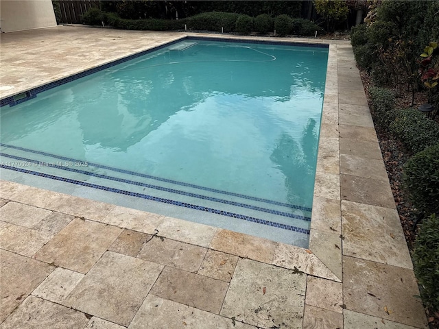 10086 NW 89th Ter, Doral, FL 33178 - outdoor pool featuring a patio