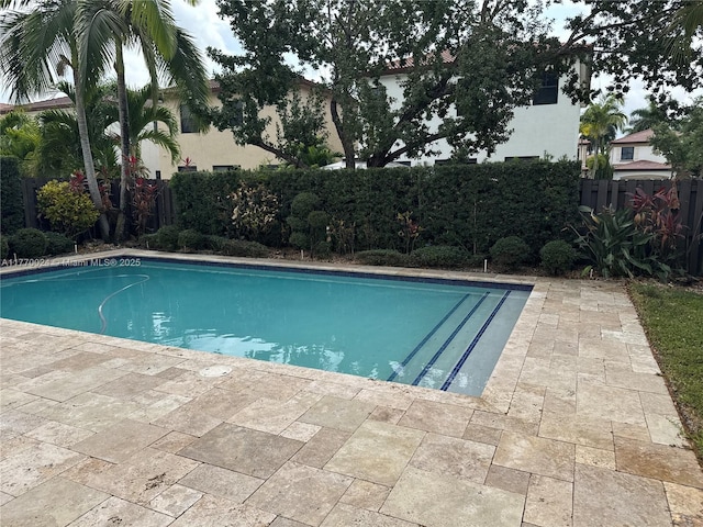 10086 NW 89th Ter, Doral, FL 33178 - view of pool with a patio, fence, and a fenced in pool