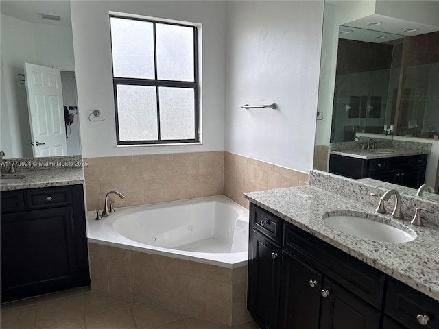 10086 NW 89th Ter, Doral, FL 33178 - full bath with a jetted tub, tile patterned flooring, and a sink