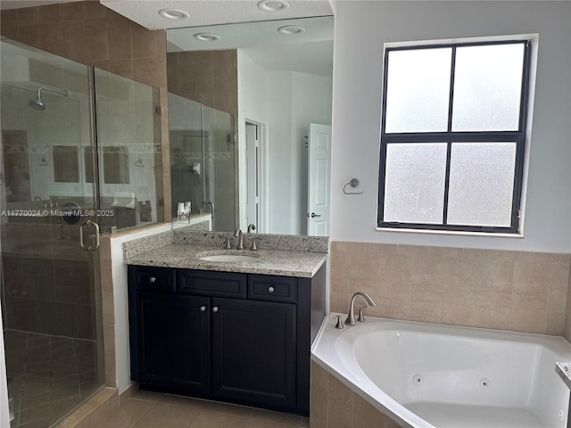 10086 NW 89th Ter, Doral, FL 33178 - full bath with a tub with jets, tile patterned floors, vanity, and a shower stall