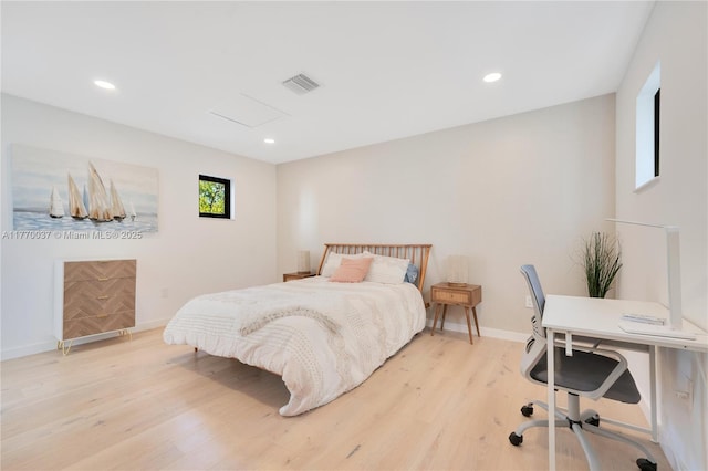 bedroom featuring light wood-style flooring, recessed lighting, baseboards, and visible vents