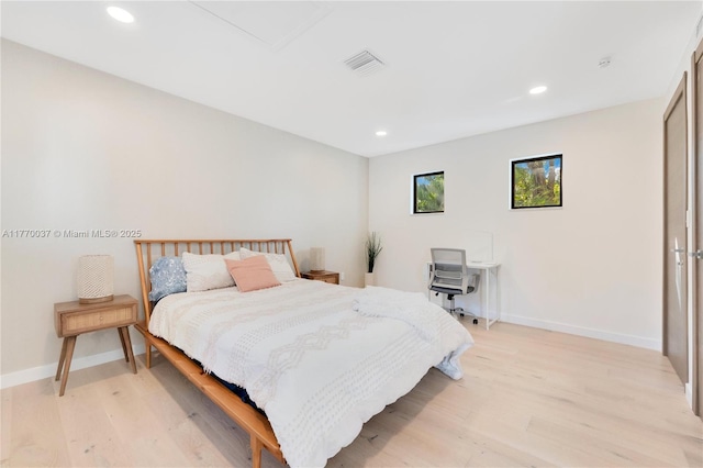 bedroom featuring baseboards, visible vents, recessed lighting, and light wood-type flooring