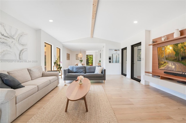 living area featuring baseboards, lofted ceiling with beams, light wood-style floors, and recessed lighting