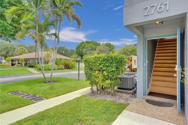 2761 S Oakland Forest Dr Unit 201, Oakland Park, FL 33309 - view of yard with central AC unit