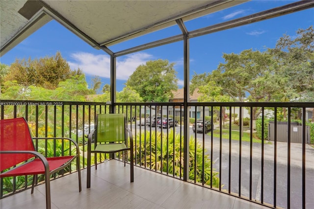 2761 S Oakland Forest Dr Unit 201, Oakland Park, FL 33309 - balcony with a sunroom