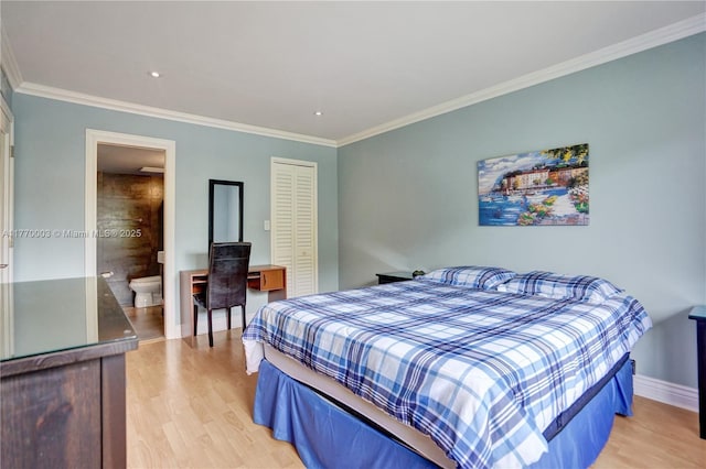 2761 S Oakland Forest Dr Unit 201, Oakland Park, FL 33309 - bedroom with a closet, ornamental molding, baseboards, and light wood-type flooring