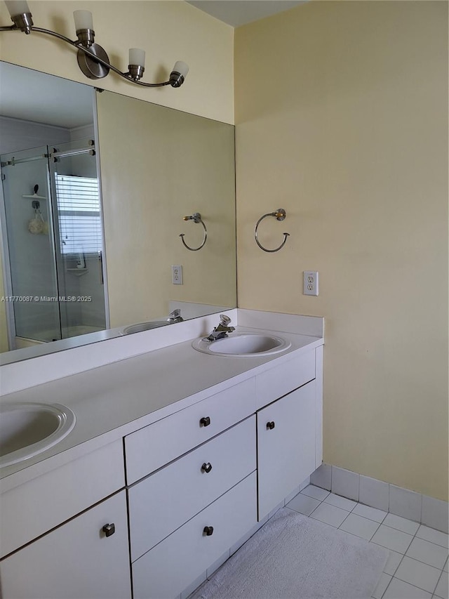 14144 SW 149th Pl, Miami, FL 33196 - full bath featuring tile patterned flooring, double vanity, a sink, and a stall shower