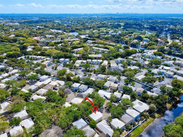 aerial view featuring a residential view and a water view