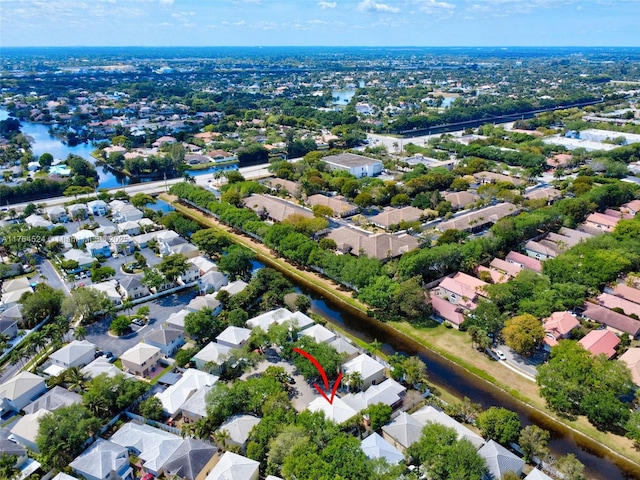 aerial view featuring a water view and a residential view