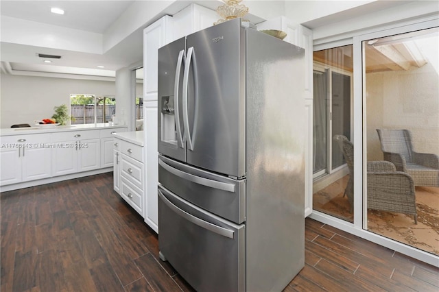 19915 NE 10th Place Way, Miami, FL 33179 - kitchen featuring stainless steel refrigerator with ice dispenser, dark wood-style flooring, white cabinets, light countertops, and recessed lighting