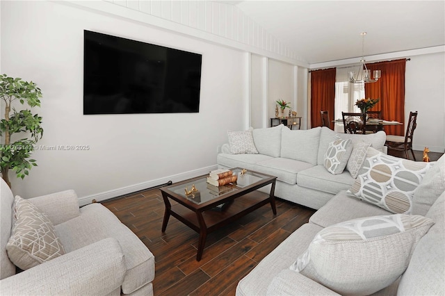 19915 NE 10th Place Way, Miami, FL 33179 - living room with a chandelier, dark wood-type flooring, lofted ceiling, and baseboards