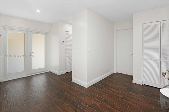 19915 NE 10th Place Way, Miami, FL 33179 - interior space featuring baseboards, dark wood-type flooring, and recessed lighting