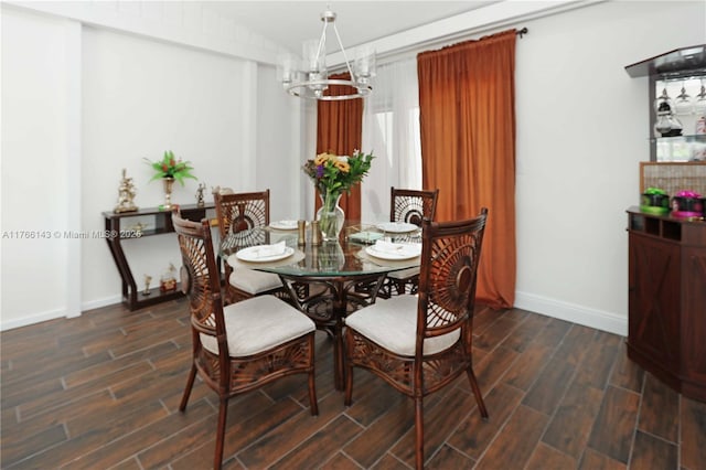19915 NE 10th Place Way, Miami, FL 33179 - dining room featuring a chandelier, dark wood finished floors, and baseboards