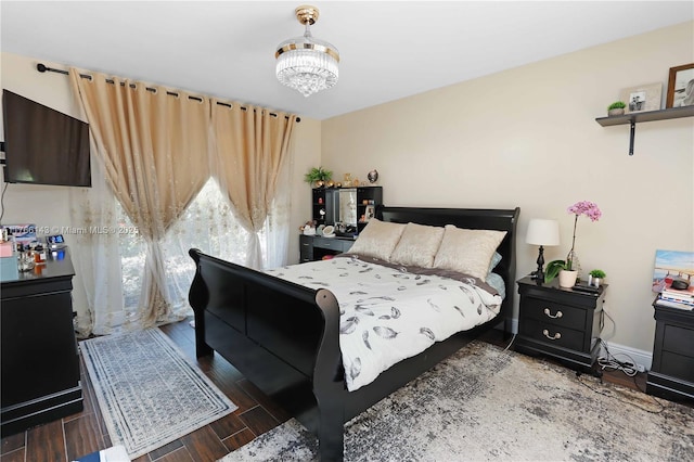 19915 NE 10th Place Way, Miami, FL 33179 - bedroom featuring a chandelier and wood finished floors