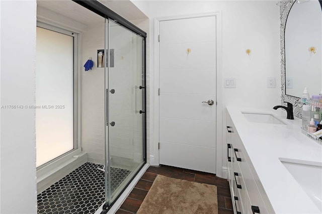 19915 NE 10th Place Way, Miami, FL 33179 - full bath with a stall shower, double vanity, and wood finished floors