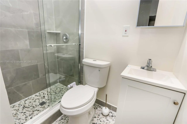 19915 NE 10th Place Way, Miami, FL 33179 - full bath with a stall shower, toilet, baseboards, and vanity