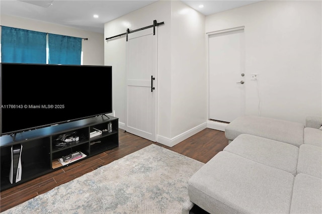 19915 NE 10th Place Way, Miami, FL 33179 - living room featuring wood finished floors, a barn door, baseboards, and recessed lighting