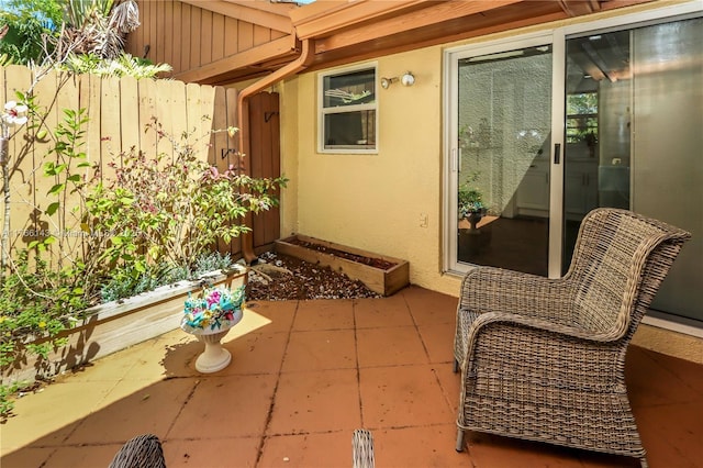 19915 NE 10th Place Way, Miami, FL 33179 - view of patio / terrace featuring fence