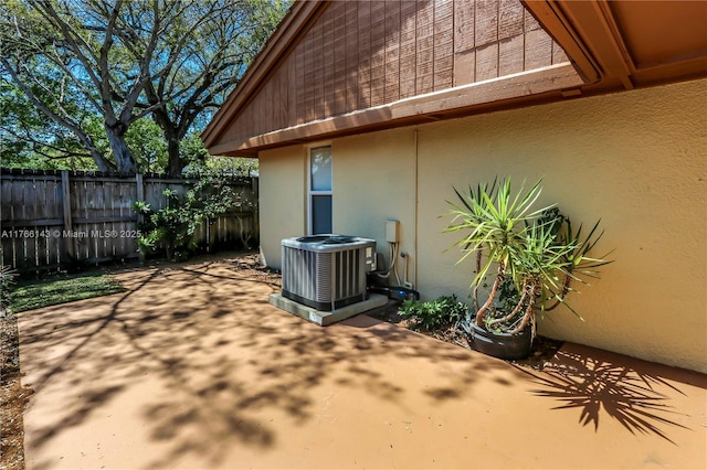 19915 NE 10th Place Way, Miami, FL 33179 - view of patio / terrace with fence and cooling unit